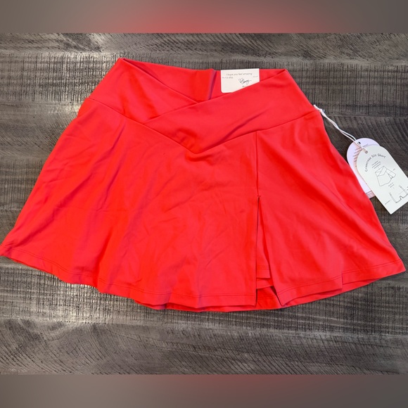 Blogilates Dresses & Skirts - Blogilates Crisscross Slit Skort- size XS